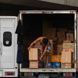 運送